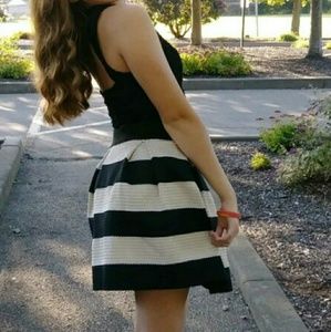 A black and gold formal dress only worn once